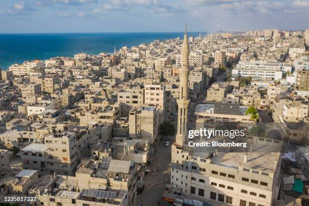 Solar panels on the roof of buildings in the Al-Shati refugee camp area in Gaza City, Gaza, on Friday, Oct. 8, 2021. Gazans uses less than 2% of the...