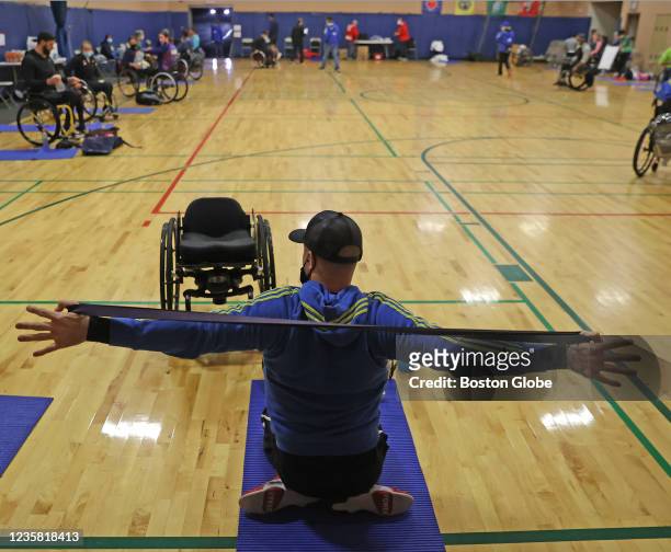 Hopkinton At the start of the 125th Boston Marathon, wheelchair marathoner Josh Cassidy from Canada does some exercise at the assembly point in a...