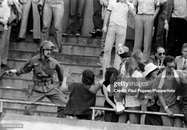 Violence on the terraces holds up the UEFA Euro 1980 Group 2 match between Belgium and England at the Stadio Comunale on June 12, 1980 in Turin,...