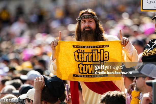 Pittsburgh Steelers fan Steelers Jesus holds a terrible towel during the game against the Denver Broncos and the Pittsburgh Steelers on October 10,...