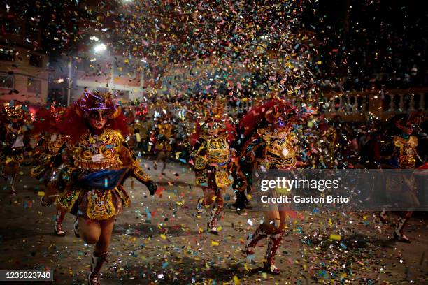 Dancers disguised as devils perform during a traditional celebration on October 9, 2021 in Oruro, Bolivia. The Fraternidad Ferroviaria de la Diablada...