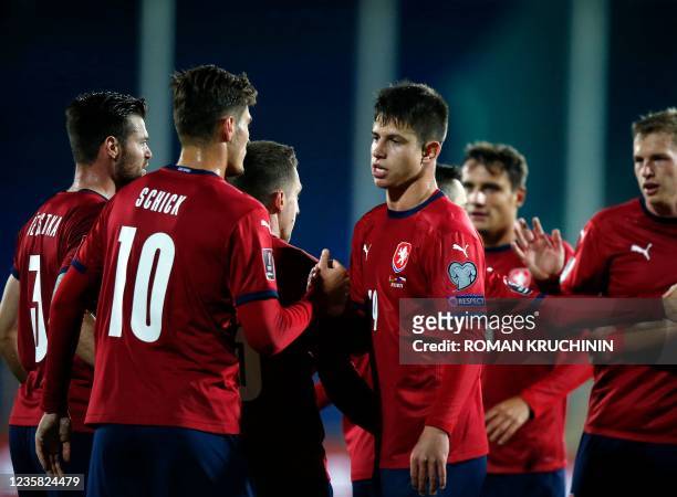 Czech Republic's forward Patrik Schick celebrates with teammates after scoring the opening goal during the FIFA World Cup Qatar 2022 qualification...