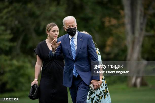 Granddaughter Naomi Biden, U.S. President Joe Biden and first lady Jill Biden exit Marine One on the South Lawn of the White House October 11, 2021...