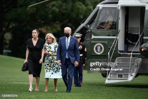 Granddaughter Naomi Biden, U.S. President Joe Biden and first lady Jill Biden exit Marine One on the South Lawn of the White House October 11, 2021...