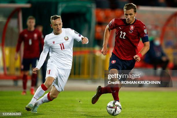 Belarus' Andrei Solovei and Czech Republic's midfielder Tomas Soucek vie for the ball during the FIFA World Cup Qatar 2022 qualification football...