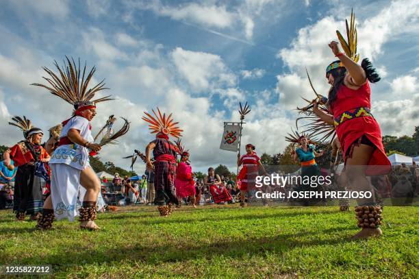 Members of Cetiliztli Nauhcampa perform traditional dances at the first Annual Indigenous Peoples' Day Ceremonial Celebration in Newton,...