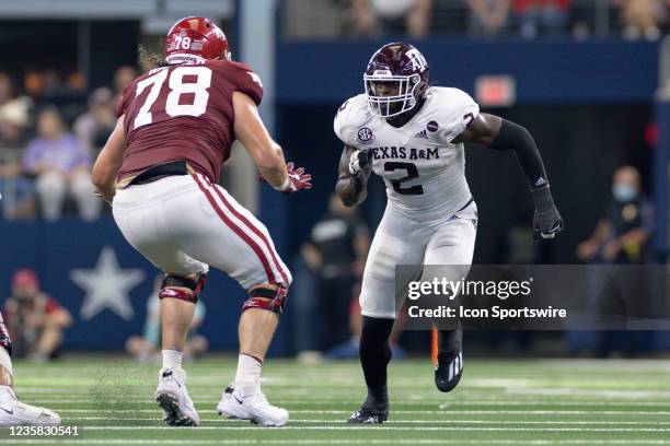 Texas A&M Aggies defensive lineman Michael Clemons runs up field as Arkansas Razorbacks lineman Dalton Wagner blocks during the Southwest Classic...