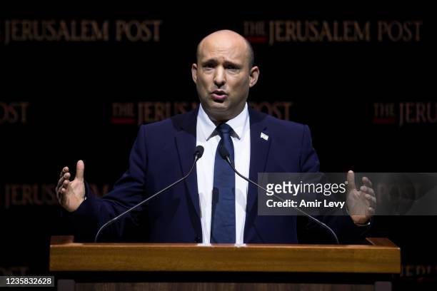 Israeli Prime Minister Naftali Bennett speaks at the Jerusalem Post's annual coference on October 12, 2021 in Jerusalem, Israel. The conference...