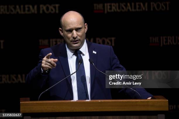 Israeli Prime Minister Naftali Bennett speaks at the Jerusalem Post's annual coference on October 12, 2021 in Jerusalem, Israel. The conference...