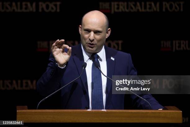 Israeli Prime Minister Naftali Bennett speaks at the Jerusalem Post's annual coference on October 12, 2021 in Jerusalem, Israel. The conference...