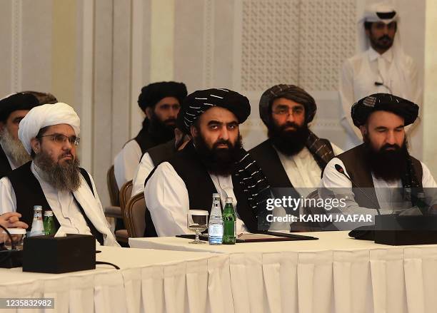 Members of the Taliban delegation Shahabuddin Delawar , Amir Khan Muttaqi, and Khairullah Khairkhwa meet with foreign diplomats in Qatar's capital...