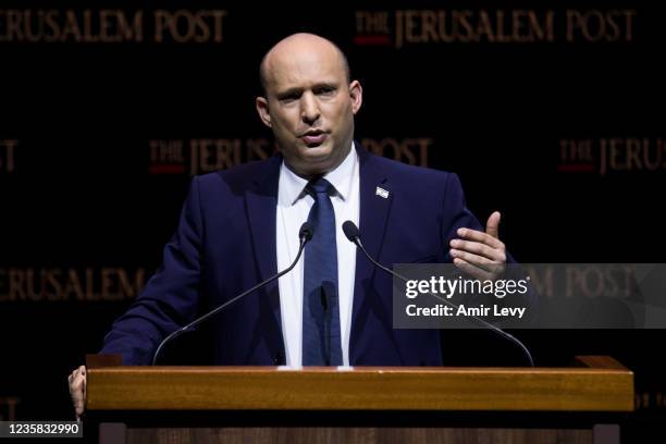 Israeli Prime Minister Naftali Bennett speaks at the Jerusalem Post's annual coference on October 12, 2021 in Jerusalem, Israel. The conference...