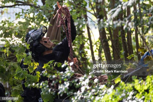 Enforcement agents from the National Eviction Team commence works to evict environmental activists opposed to the HS2 high-speed rail link from...