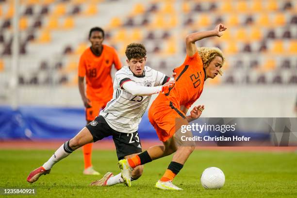 Ben Bobzien of Germany U19 in action against Xavi Simons of Netherlands U19 during the Four Nations Tournament match between Germany U19 and...