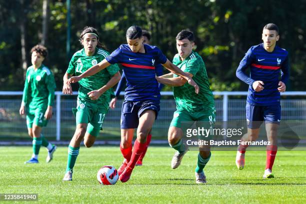 Kevin DANOIS of France U18, Amine MESSOUSSA of France U18 and Allan BERKACHE of Algeria during the friendly international soccer match between France...