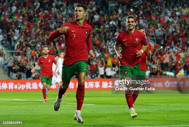 Cristiano Ronaldo of Manchester United and Portugal celebrates after scoring a goal during the 2022 FIFA World Cup Qualifier match between Portugal...