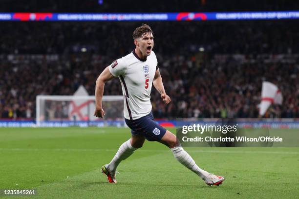 John Stones of England celebrates after scoring their 1st goal during the 2022 FIFA World Cup Qualifier match between England and Hungary at Wembley...