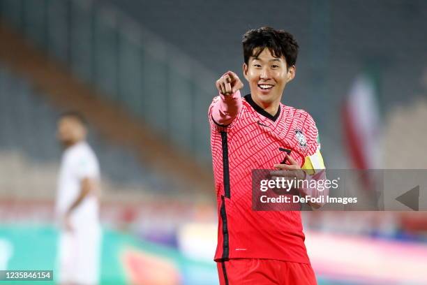 Son Heung Min of South Korea celebrates after scoring his team's first goal during the 2022 FIFA World Cup Qualifier match between Iran and South...