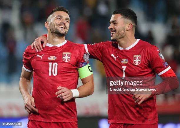 Dusan Tadic of Serbia celebrates after scoring a goal with Nemanja Radonjic during the 2022 FIFA World Cup Qualifier match between Serbia and...
