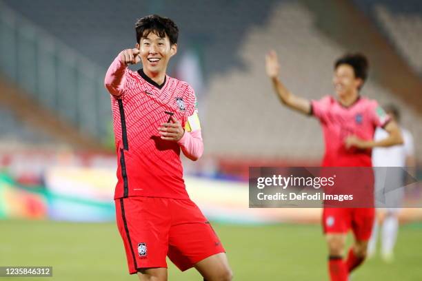 Son Heung Min of South Korea celebrates after scoring his team's first goal during the 2022 FIFA World Cup Qualifier match between Iran and South...