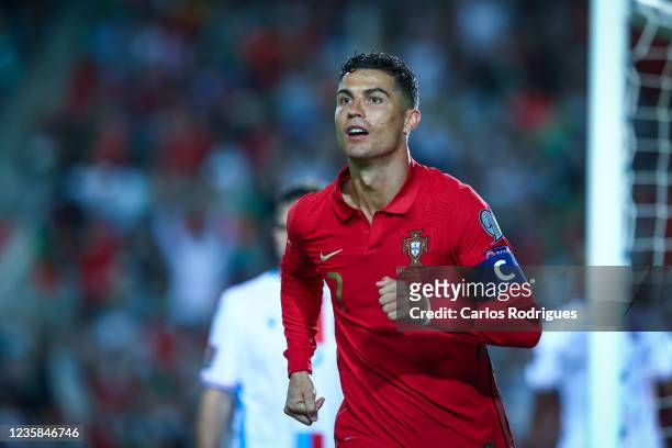 Cristiano Ronaldo of Manchester United and Portugal celebrates scoring Portugal's fifth goal and his third in the match during the 2022 FIFA World...