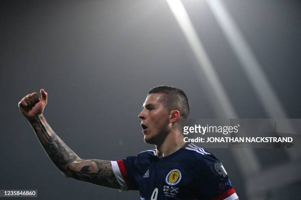 Scotland's forward Lyndon Dykes celebrates scoring the 1-0 goal during the football match between Faroe Islands and Scotland, in the Torsvollur...