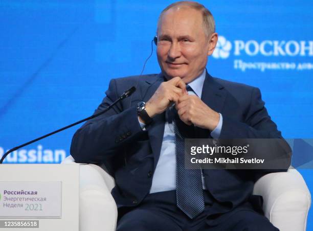 Russian President Vladimir Putin smiles during the Russian Energy Week 2001 plenary meeting on October 13, 2021 in Moscow, Russia.