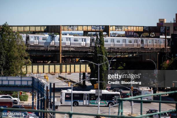 Train runs on an elevated track in the 75th precinct in the East New York neighborhood in the Brooklyn borough of New York, U.S., on Sunday, Sept....