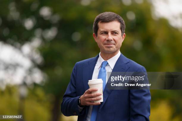 Transportation Secretary Pete Buttigieg arrives for a television interview with CNBC outside the White House October 13, 2021 in Washington, DC. With...
