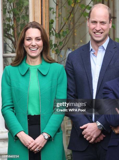 Prince William, Duke of Cambridge and Catherine, Duchess of Cambridge smile as they visit Kew Gardens to take part in a Generation Earthshot event...