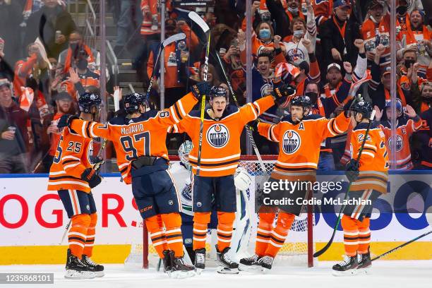 Jesse Puljujarvi of the Edmonton Oilers celebrates a goal against the Vancouver Canucks with teammates Darnell Nurse, Connor McDavid, Leon Draisaitl...