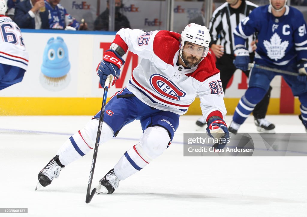 Toronto Maple Mathiue Mathieu Perrault of the Montreal Canadiens skates against the Toronto ...