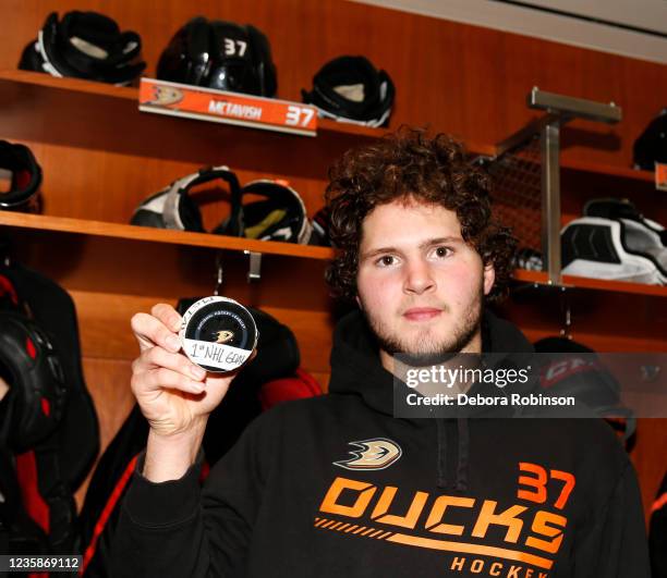 Mason McTavish of the Anaheim Ducks poses for a photo with his 1st NHL Goal puck against the Winnipeg Jets at Honda Center on October 13, 2021 in...