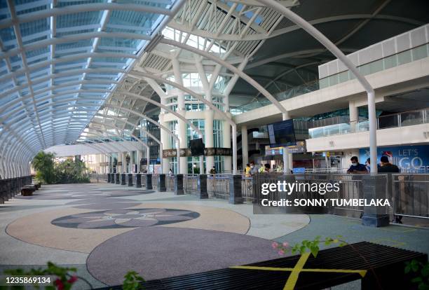 General view shows the international arrivals terminal at Ngurah Rai airport in Tuban on Indonesia's resort island of Bali on October 14 on the first...