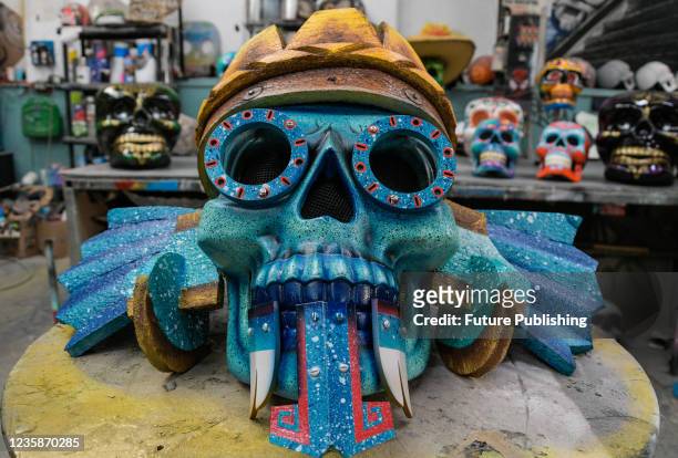 General view of monumental skulls, during the preparations for the Day of the Dead Parade 'Mexican roots' in the Visual Arts workshop "El Volador",...