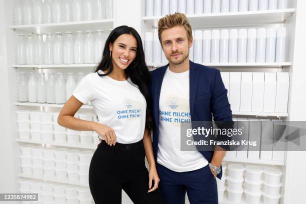 Hanna Weig and her husband Joern Schloenvoigt during the Initiative Milch event at Supercandy Pop-up Museum Cologne on October 14, 2021 in Cologne,...