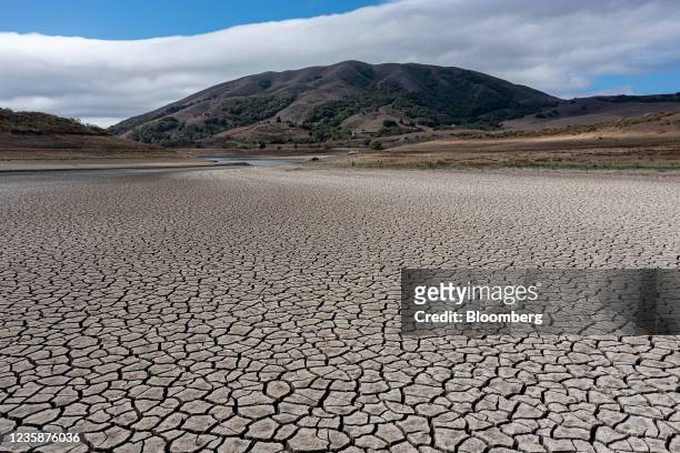 Cracked lake bed at Nicasio Reservoir during a drought in Nicasio, California, U.S., on Wednesday, Oct. 13, 2021. Residents failed to significantly...