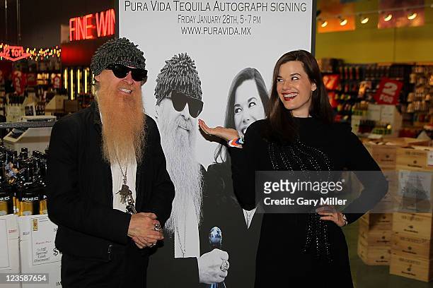 Musician/vocalist Billy Gibbons of ZZ Top and his wife Gilligan Gibbons pose after a signing of Pura Vida Tequila at Gabriel's Liquor on January 28,...