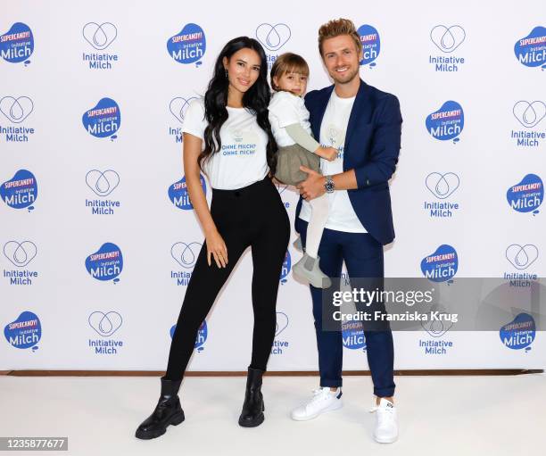 Hanna Weig, her husband Joern Schloenvoigt and their daughter Delia Schloenvoigt during the Initiative Milch event at Supercandy Pop-up Museum...