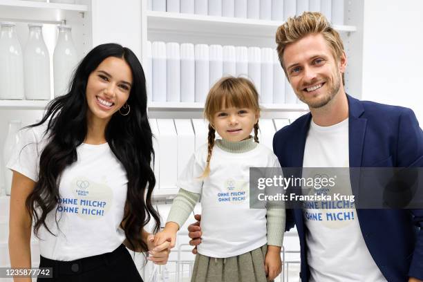 Hanna Weig, her husband Joern Schloenvoigt and their daughter Delia Schloenvoigt during the Initiative Milch event at Supercandy Pop-up Museum...