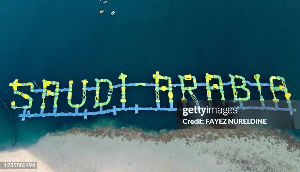 Picture shows a floating blow-up water park that spells "Saudi Arabia" in English letters, at Pure Beach in King Abdullah Economic City -- about 125...