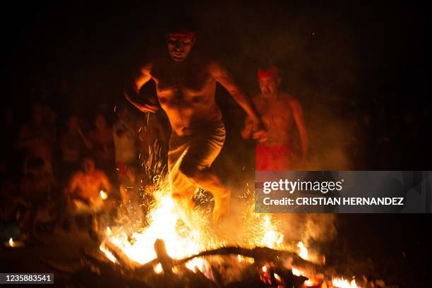 Graphic content / People take part in the "Baile de la Candela" religious ceremony on the Sorte mountain, in Yaracuy state, Venezuela, on October 12,...