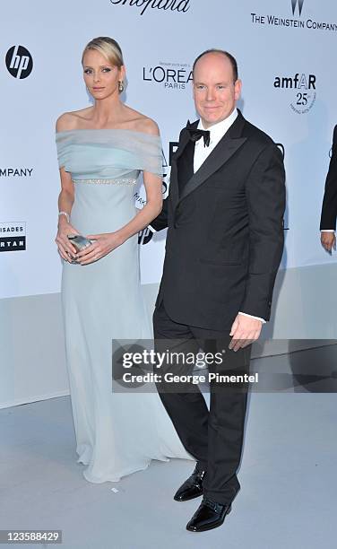 Prince Albert of Monaco and Charlene Wittstock attend amfAR's Cinema Against AIDS Gala during the 64th Annual Cannes Film Festival at Hotel Du Cap on...