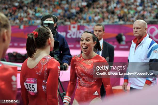 Beth Tweddle representing Great Britain reacts after completing her best routine on uneven bars during the womens artistic qualification on day 2 of...