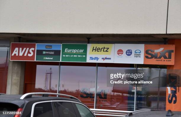 October 2021, North Rhine-Westphalia, Cologne: Logo, lettering of the car rental companies at Terminal 1 of Cologne Bonn Airport Photo: Horst...