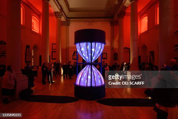 Visitors admire the artwork 'Hourglass' by British artists Emergency Exit Arts in Holy Trinity Church during the annual 'Light Night Leeds' festival...