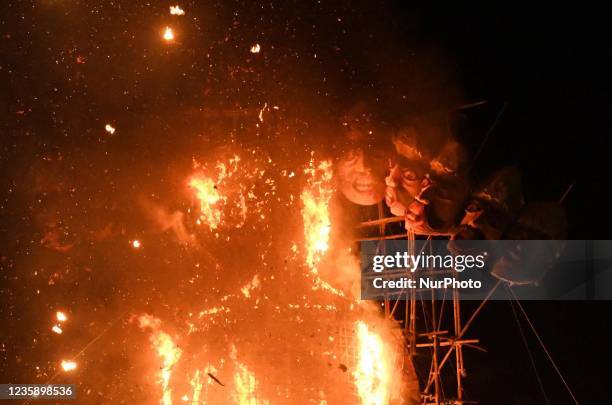 Effigies of mythological demon king Ravana and his kins are burned during Dussehra festival celebrations in Guwahati ,India on Oct 15,2021.