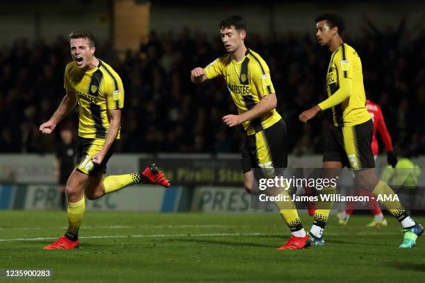 Conor Shaughnessy of Burton Albion celebrates after scoring a goal to make it 2-1 during the Sky Bet League One match between Burton Albion and...