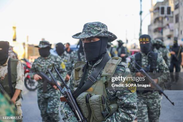 Members of Saraya Al-Quds Brigade, the military wing of the Islamic Jihad movement seen during a military parade of the missile unit, in Gaza City....