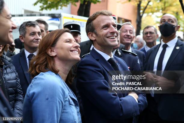 French president Emmanuel Macron stands next to French Junion Sports Minister Roxana Maracineanu during the closing ceremony of the 127th National...